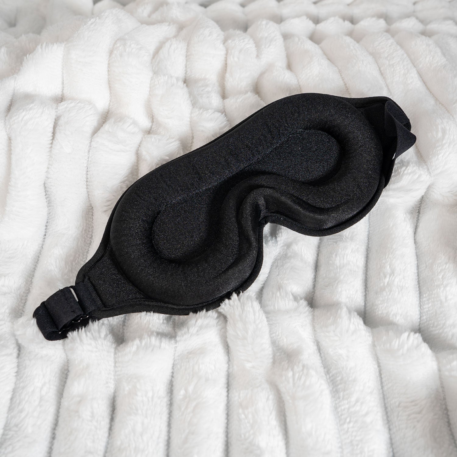 slaapmasker op deken